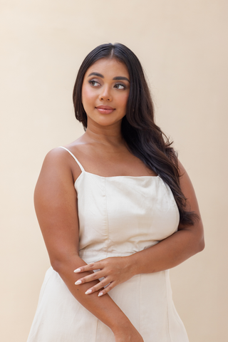 Rawbought Terra Linen Midi Tie-Back Dress featuring tie-back detail, elasticated waistband, and panelled seams, fully lined and made from soft linen blend, available in sizes XS to XXXL in monochromatic colours Coal and Sand.