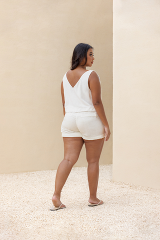 Rawbought Terra Tailored Shorts in high waist design with pockets and folded hem, offering a smart-casual look in lightweight soft linen blend, available in sizes XS to XXXL in monochromatic Coal and Sand