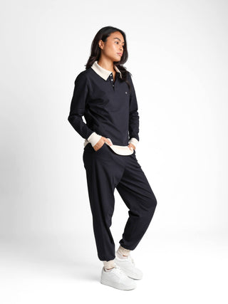 Unisex cotton-modal joggers with tapered legs, deep pockets, drawstring elasticated waist, and soft structure.