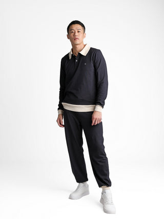 Unisex cotton-modal joggers with tapered legs, deep pockets, drawstring elasticated waist, and soft structure.