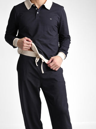 Unisex cotton-modal joggers with tapered legs, deep pockets, drawstring elasticated waist, and soft structure.