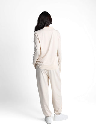 Unisex cotton-modal joggers with tapered legs, deep pockets, drawstring elasticated waist, and soft structure.