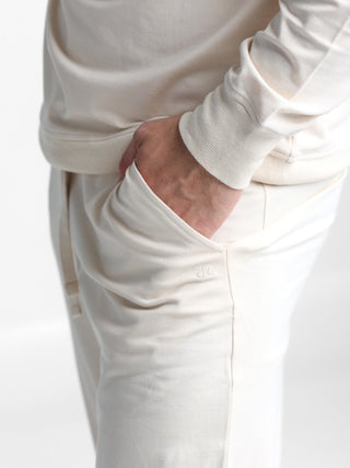 Unisex cotton-modal joggers with tapered legs, deep pockets, drawstring elasticated waist, and soft structure.