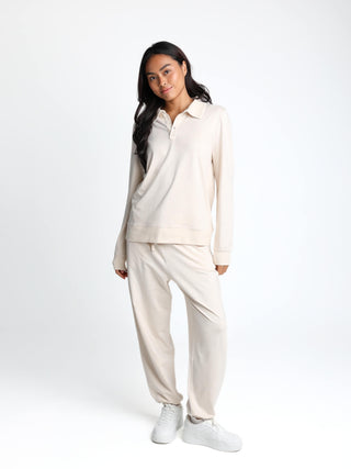 Unisex cotton-modal joggers with tapered legs, deep pockets, drawstring elasticated waist, and soft structure.