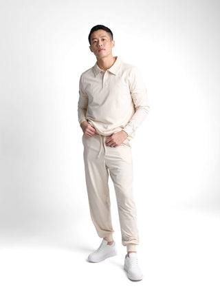 Unisex cotton-modal joggers with tapered legs, deep pockets, drawstring elasticated waist, and soft structure.