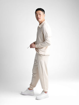 Unisex cotton-modal joggers with tapered legs, deep pockets, drawstring elasticated waist, and soft structure.