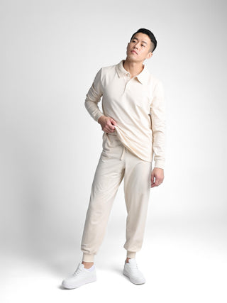 Unisex cotton-modal joggers with tapered legs, deep pockets, drawstring elasticated waist, and soft structure.